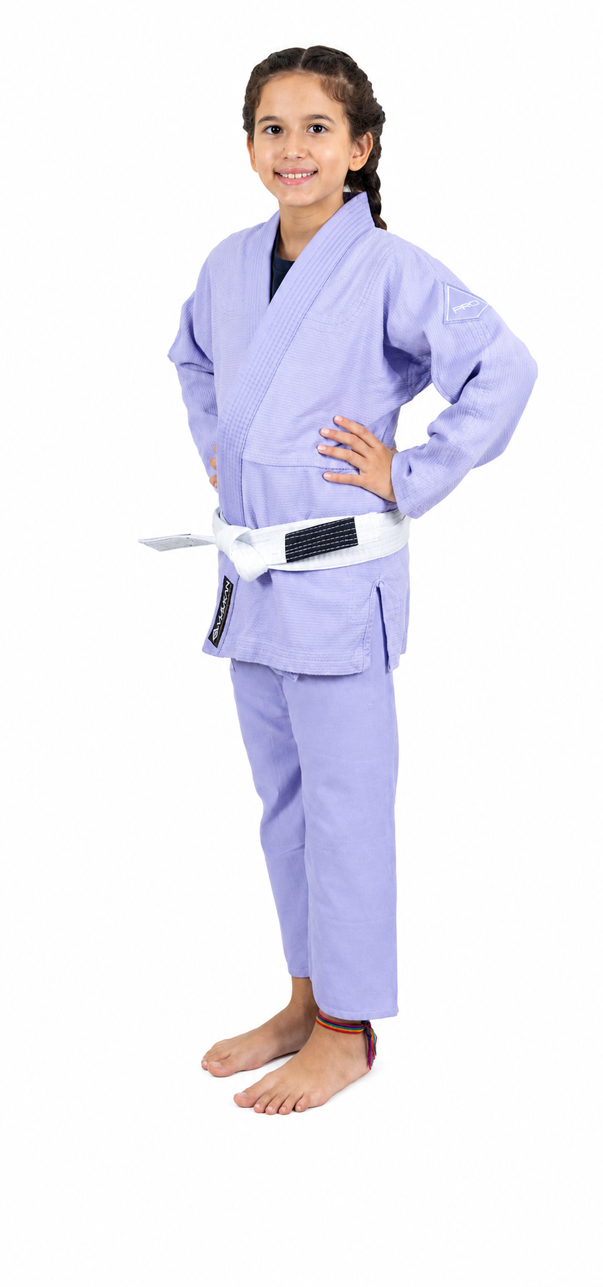 A young girl modeling a Vulkan light purple Brazilian Jiu-Jitsu gi with a white belt, standing against a plain white background.