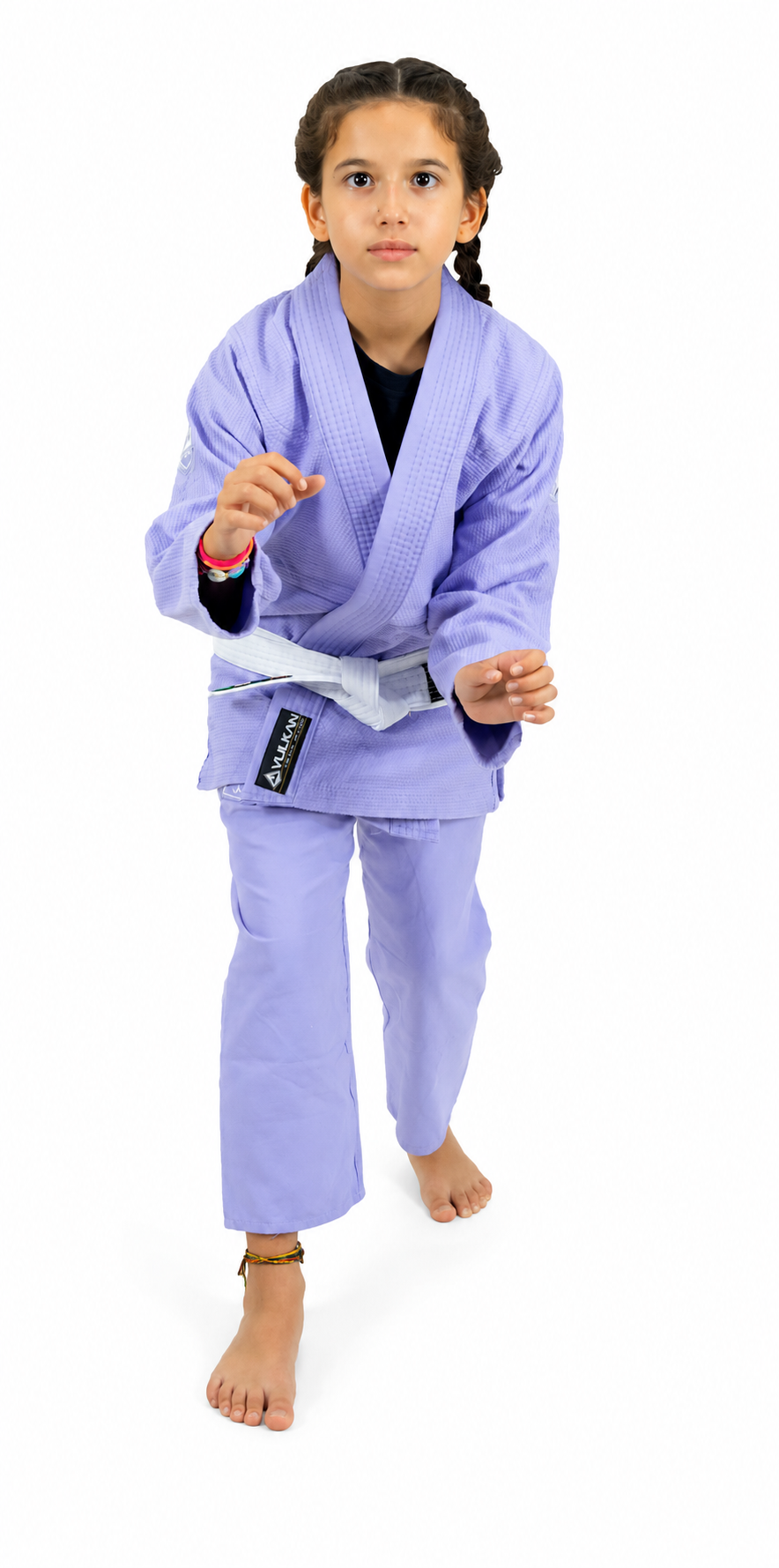 A young girl modeling a Vulkan light purple Brazilian Jiu-Jitsu gi with a white belt, standing against a plain white background.