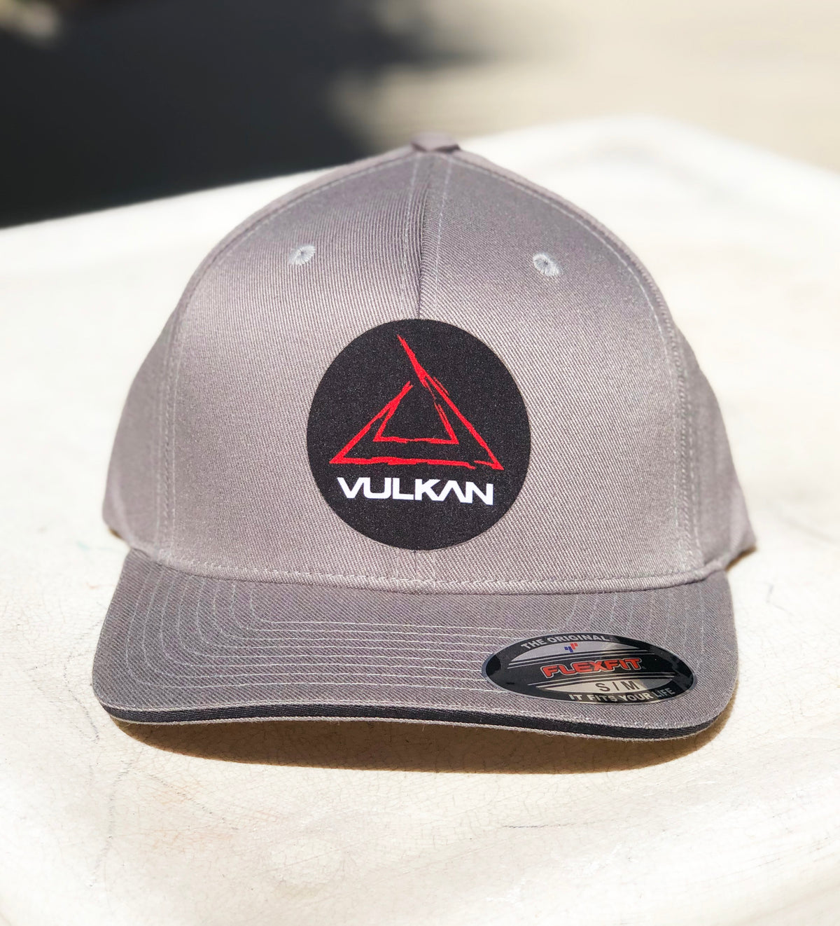 Vulkan Sketch Logo FlexFit Baseball Hat - GREY/RED