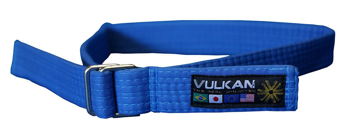 Man wearing a blue Vulkan Streetwear Belt, styled to reflect his Jiu Jitsu lifestyle.