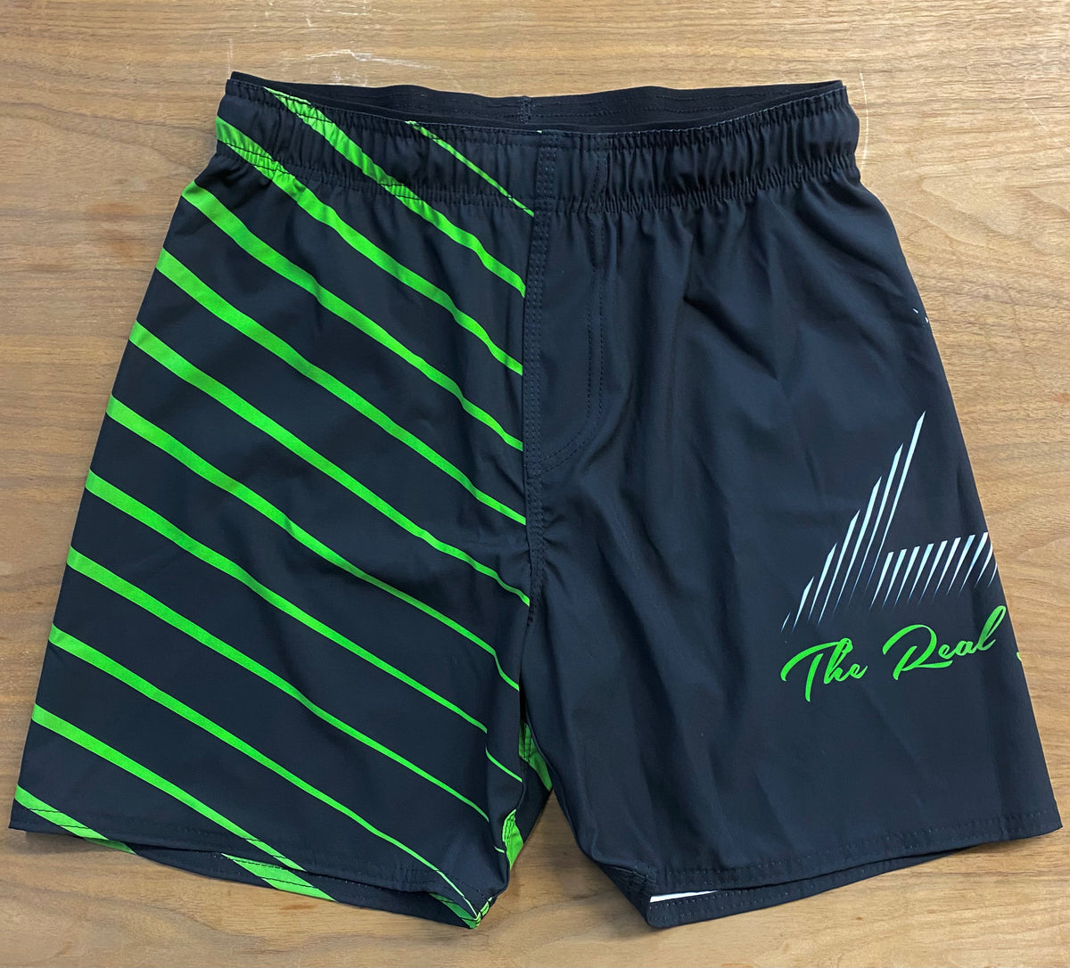 MMA SPEAR FIGHT SHORTS BLACK GREEN Vulkan International Inc